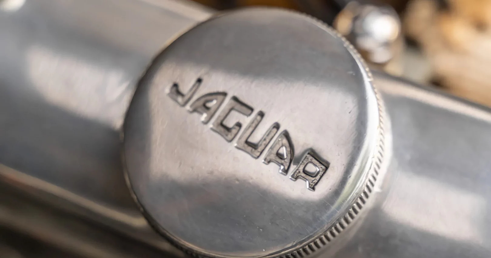1966_jaguar_xke-22_1966_jaguar_xke-22_b64b4d0f-c78b-4b6b-a6b5-795ab94e37ec-QCWh1k-35955-35956-scaled